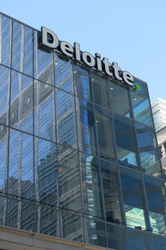 sign outside Deloitte Canada, an accounting firm, located here at 8 Adelaide St W, northwest corner of Yonge St, Toronto