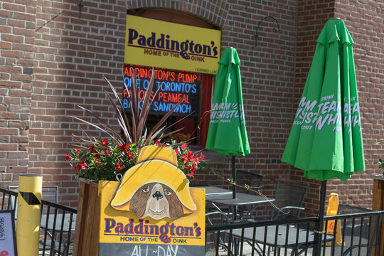 signs and bistro outside Paddington's Pump, a diner, located at 91 Front St E, inside St Lawrence Market, Toronto