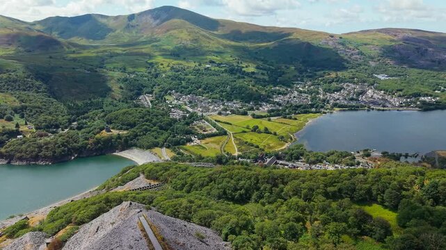 High altitude view over Llanberis village, Llyn Padarn lake and surrounding mountains in Eryri National Park, North Wales