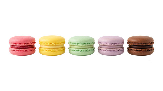 Delicious colorful French macarons arranged in a row isolated on transparent background