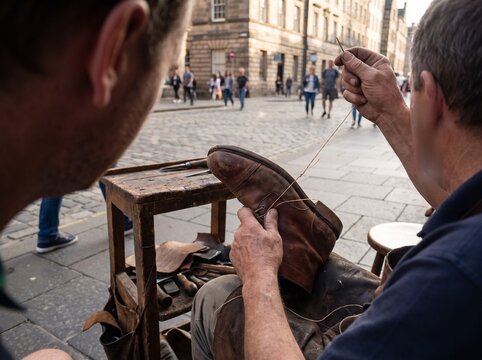 A shoe sole helps someone fix their shoe 