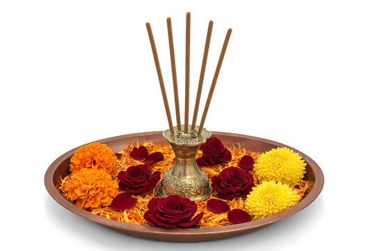 Traditional Incense Holder Surrounded by Colorful Flower Petals and Marigolds