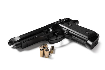 Obraz premium Gun violence and crime prevention, black semi-automatic pistol with brass ammunition cartridges isolated on a clean white background for safety awareness