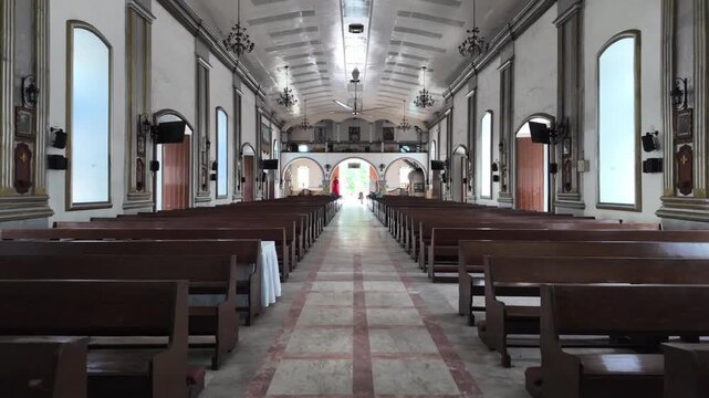 Church interior of Cathedral with empty wooden pews, Dumaguete, Philippines
