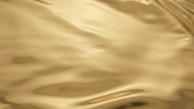 Abstract Luxury Liquid Gold Flowing Surface Metallic Waves Background