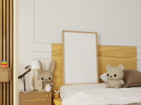 Blank wooden picture frame mockup on bed with plush toys in children's bedroom- 3D rendering