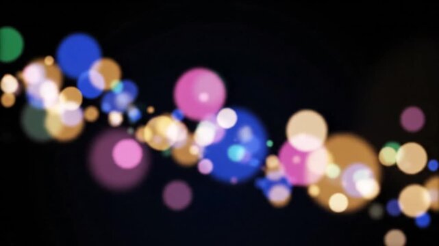 Bokeh Lights in Dark Setting Moving Through Colorful Orbs