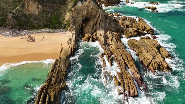 Mimosa Rocks National Park, Mogareeka, New South Wales, Australia &ndash; 4K aerial drone view of turquoise ocean, Moon Bay, Wajurda Point, rugged rocky headlands, coastal forest, white sand beach