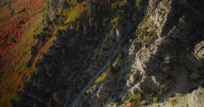 Cinematic Aerial View Near Rocky Mountain Of Glowing Utah Valley Below