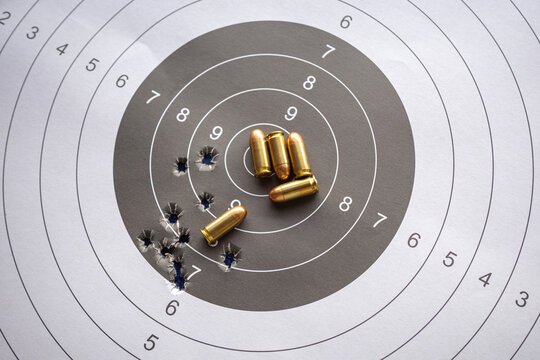 bullets on paper target for shooting practice