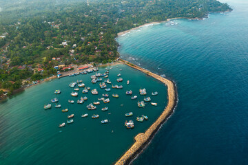 Fototapeta premium Fishing Boats Anchored in Nilwella Fishery Harbour Overhead View