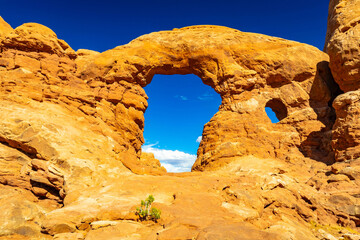 Turret Arch window opens to clear blue Utah skies © PhotoSpirit