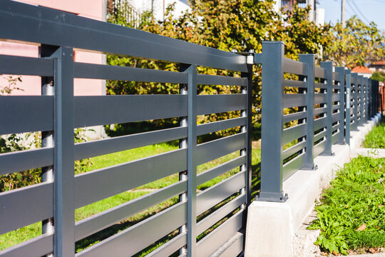 Modern fence with aluminum or metal shutter
