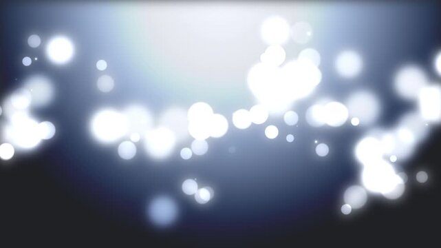 Abstract white bokeh particles floating across blue background with soft light leaks and cinematic motion