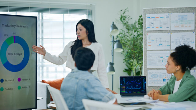 Group of young creative business brain storm meeting presentation,discussing roadmap to product launch, planning,strategy,new business development,working with new startup project in office.