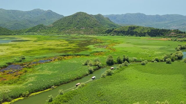 Aerial View of Skadar Lake Wetlands and Green Mountains, Montenegro