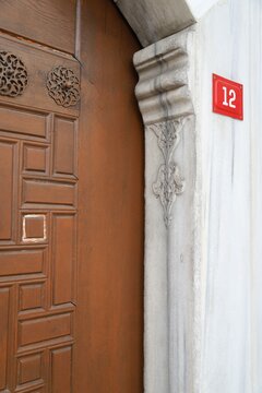 The marble carved decoration on the historic door lintel