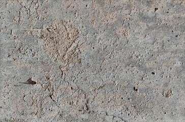 Rough gray concrete texture suitable for background designs, industrial projects, construction themes, urban aesthetics, textures, weathered surfaces, and backgrounds. © Dinamartina93