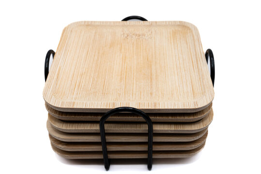 Stack of sliced whole wheat bread loaves on wooden board. Freshly baked multigrain sandwich bread slices arranged for food photography.