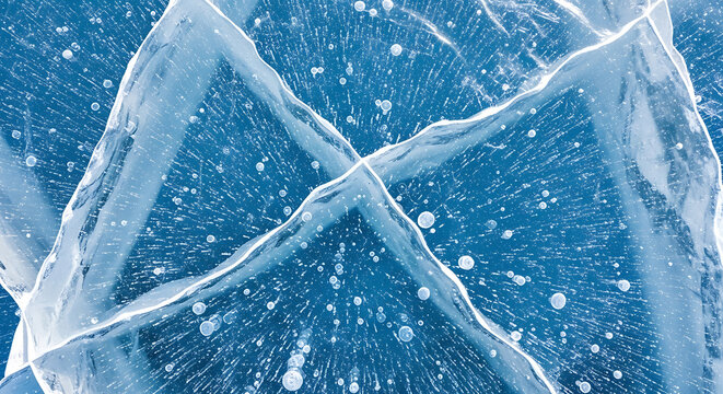 Ice cracks pattern with air bubbles, cold winter texture