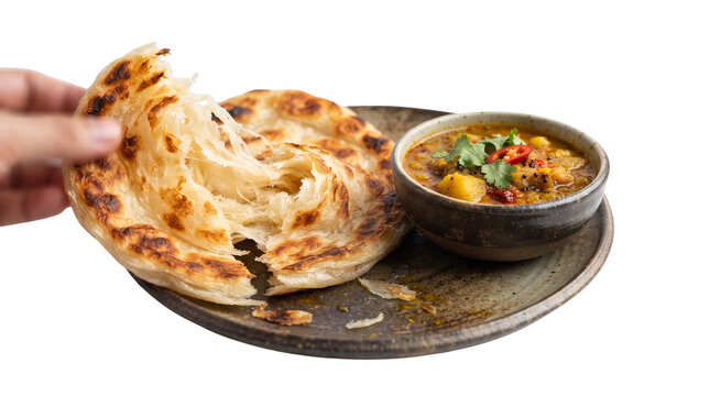 Crispy Paratha Flatbread with Spicy Curry Dip, Fresh Flaky Indian Bread, Hand Tearing Layered Roti on Ceramic Plate