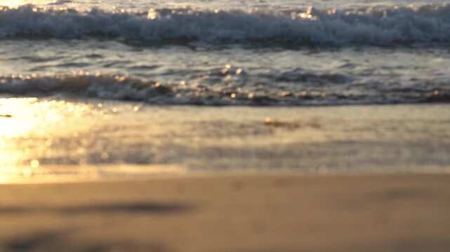 A Serene Sunset Over Gentle Ocean Waves, Capturing the Tranquility of the Seashore with Soft Glimmers of Light Reflecting on Water's Surface