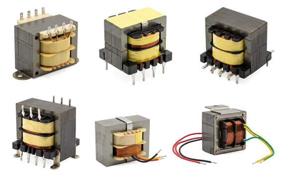 Set of low power electrical transformers with copper winding coils and metal cores on transparent background. 
