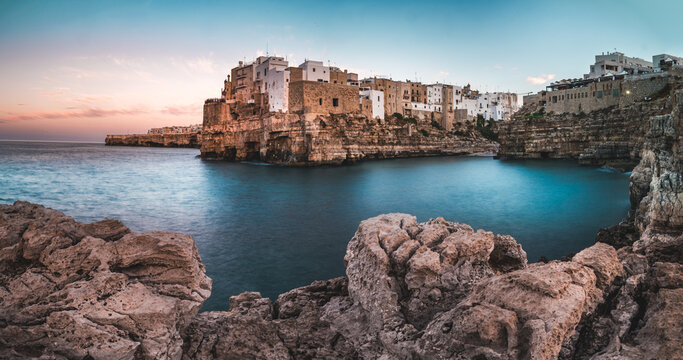 Polignano a Mare old town perched on limestone cliffs above the Adriatic Sea, Puglia, Italy