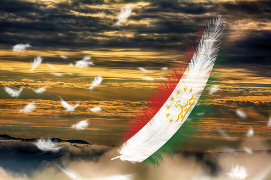 3D illustration. Flag of Tajikistan on a feathers fluttering in the sky background.