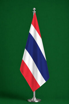 3D illustration. Flag of Thailand on a ceremonial standing flag on a pole with a metal base.