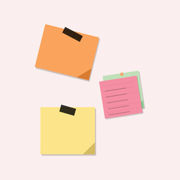Colorful sticky notes with a paper clip and a binder clip