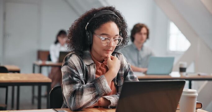 Girl, student and laptop in university with headphones, project and tutorial with online studying. Academic, tech and streaming in community college with visual learning, lesson platform or education
