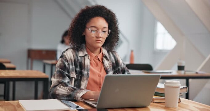 Girl, student and laptop in class with notes, writing information and research with online studying. Person, tech and notepad in community college with assignment, lesson platform and education