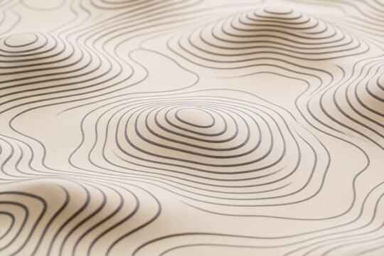This image displays a smooth beige surface marked with concentric contour lines, forming a topographic pattern of gentle elevations and curves.