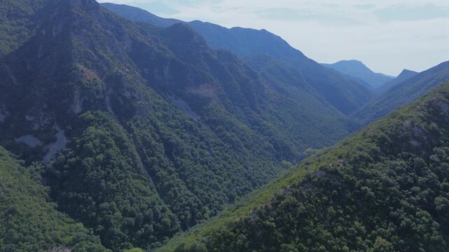 Aerial view of forested mountain slopes surrounding Acheron Gorge in Greece