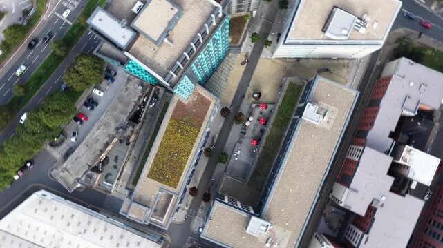 Aerial drone footage of Sheffield city centre, England, showing the Bramall Lane area and Sheldon Street from a bird&rsquo;s-eye perspective. The drone slowly rotates in a smooth 360-degree