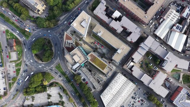 Aerial drone footage of Sheffield city centre, England, showing the Bramall Lane area and Sheldon Street from a bird&rsquo;s-eye perspective. The drone slowly rotates in a smooth 360-degree.