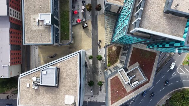Aerial drone footage of Sheffield city centre, England, showing the Bramall Lane area and Sheldon Street from a bird&rsquo;s-eye view. The drone moves smoothly forward over the urban landscape