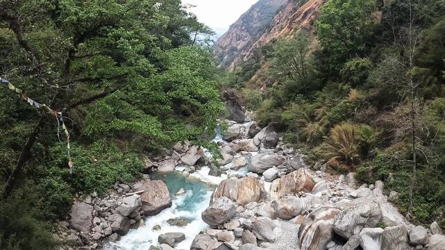 Scenery view of Langtang Khola river a river coming from the south flows down along the Langtang trekking route, Nepal. 