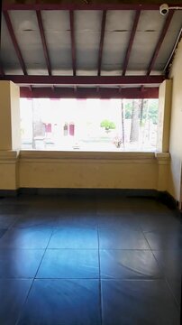 Veranda View of Historic Courtyard and Palm Trees at Fort Rotterdam, Makassar, Indonesia