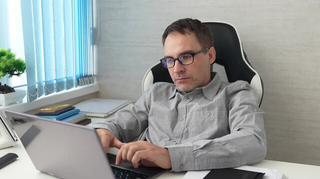 Coding, office and man on computer for programming, system upgrade and software design. Network, IT programmer and worker with pc for web development, engineering and cybersecurity for diagnostics