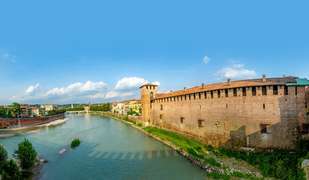 skyline of Verona, Adige River and fortified  historic Castelvecchio Bridge, also known as the Scaliger Bridge or Ponte Scaligero, Verona,