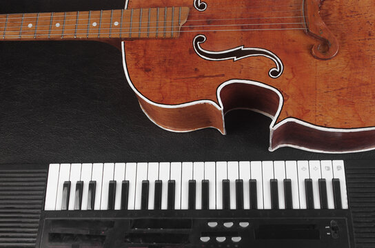 Acoustic guitar and synthesizer keyboard.