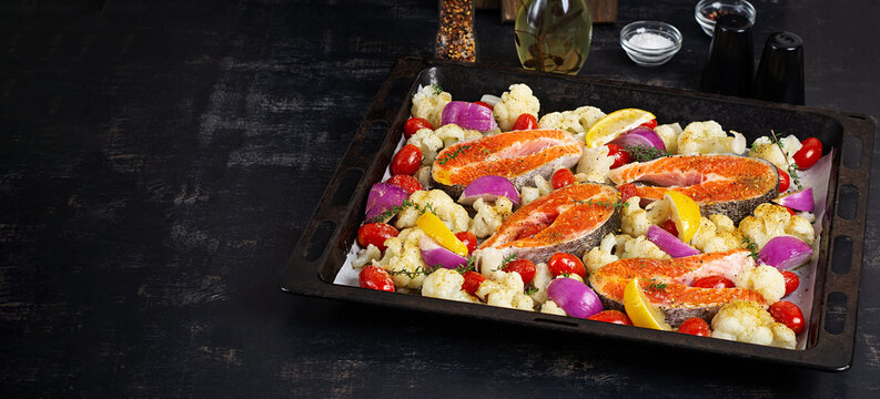 Healthy Sheet Pan Meal Preparation with Salmon and Vegetables. Overhead