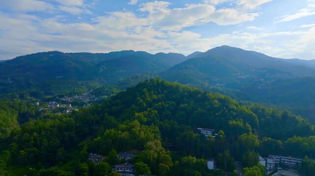 Aerial View of Green Mountain Valley and Village in Forested Hills