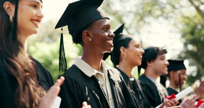 Happy, man and students with diploma at graduation, speech and celebration of degree completion. People, applause and graduate outdoor with regalia, university recognition and educational milestone