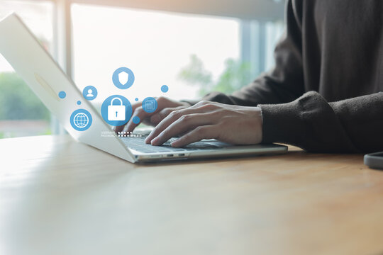 close up man hand use laptop to access account on website with virtual icon of PDPA for security personal information concept