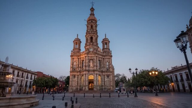 Aguascalientes Mexico historic downtown and cathedral plaza at golden hour, colonial architecture, warm stone textures and authentic Mexican city scenery