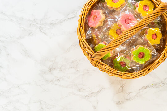 Basket of Easter Cookies with Pink and Yellow