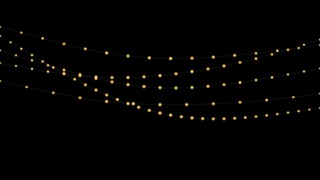 Hanging strings of golden fairy lights against a black background rows of glowing warm suspended on creating a cozy and festive atmosphere against a solid